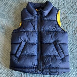 Old Navy puffer vest with pockets, zipper. Toddler boy, size 2T. NWOT.